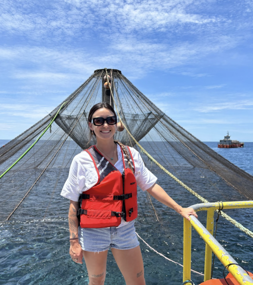 Kara at Open Blue Seafarms, an aquaculture farm that grows the marine finfish cobia in net pens about 16 km from shore.